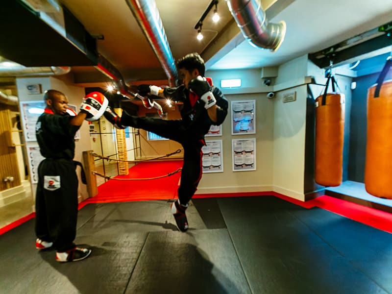Meiji Martial Arts instructors sparring within the dojo