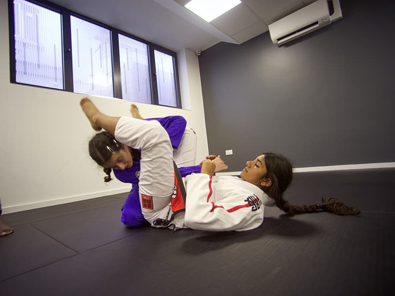 Students practicing Jiu-Jitsu at the Temple Fortune Dojo, London