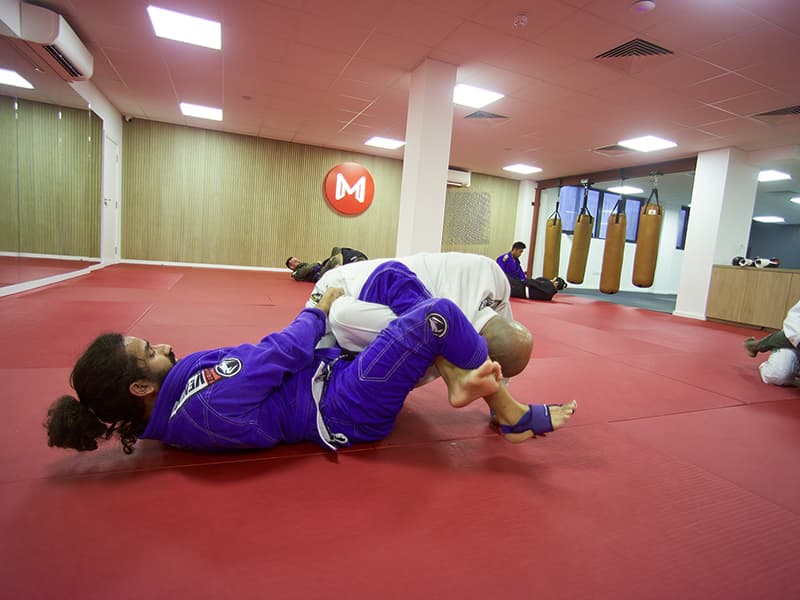 Students practicing Jiu-Jitsu at the Temple Fortune Dojo, London