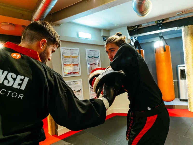 Meiji Martial Arts instructors sparring within the dojo