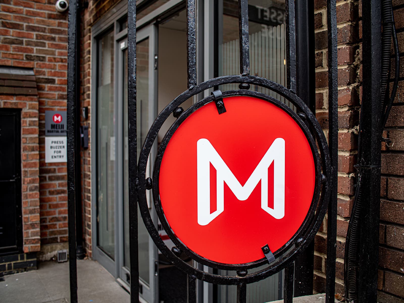 Meiji Martial Arts Logo on gate