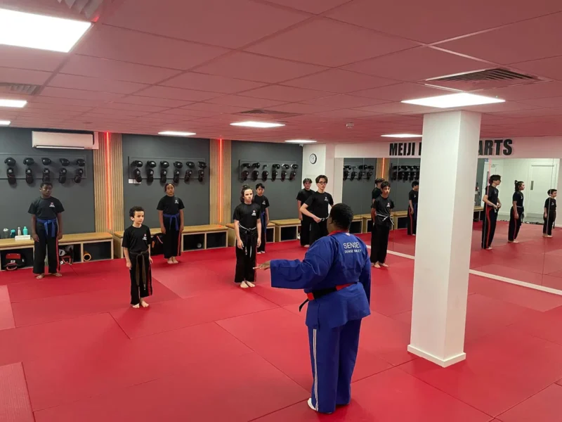 Sensei Denise Bailey in the Dojo teaching children