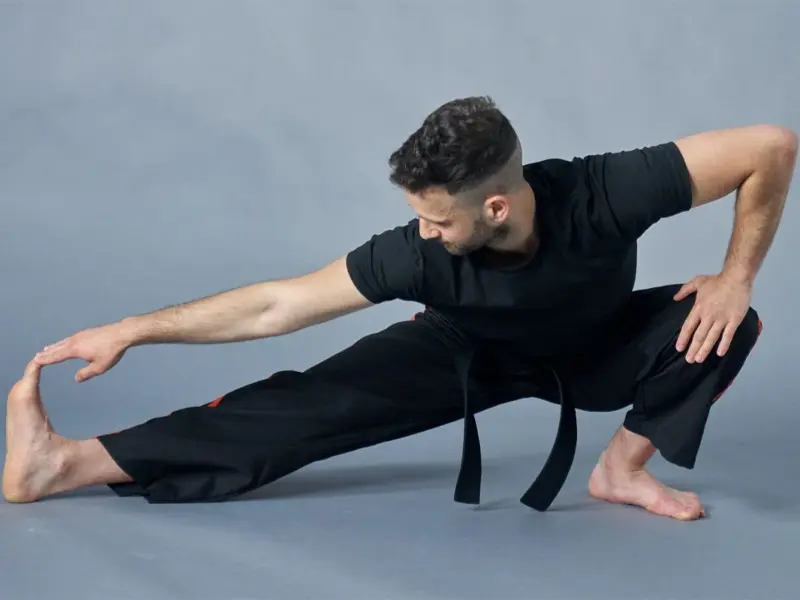 Image of a martial artist stretching